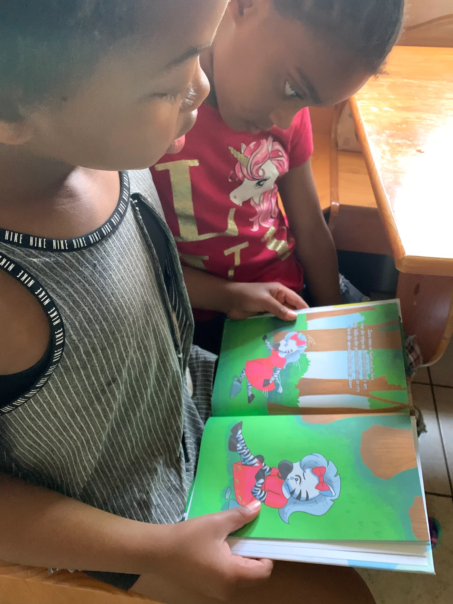 Children Reading Zippy The Zebra Book
